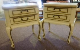 A Pair Of French Painted Bedside Cabinets, painted in cream and gilt, with two drawers, 62cm high,