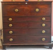 A George III Mahogany Secretaire Chest Of Drawers, the large secretaire drawer having a fall front