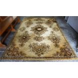 A Kashmir Machine Made Rug, Decorated with floral medallions on a gold coloured ground, 291 x 200cm