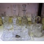A Quantity Of Crystal Wares, to include a silver necked decanter, decanters, vases and glasses, also