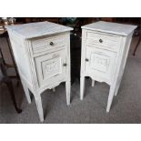 A Pair Of French Painted Bedside Cupboards With Marble Tops