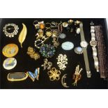A Collection Of Costume Jewellery, to include a Calvin Klein wristwatch, brooches, cufflinks,