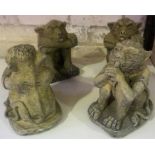 Four Composite Stone Gargoyle Figures, in seated position, 20cm high, (4)