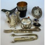 A Mixed Lot Of Silver Items, to include three assorted silver pepper pots, a Scottish silver
