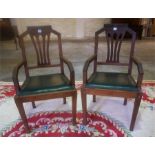 A Pair Of Oak Carver Armchairs, with shaped rail back, detachable seat, with label to reverse for