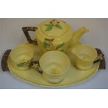 A Carlton Ware Australian Design Tea For One Set, comprising of tea pot, cup, cream and sugar on