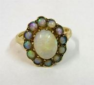 A Ladies Opal 9ct Gold Cluster Ring, size O