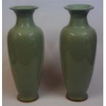 A Large Pair Of Chinese Celadon Glazed Baluster Vases, 20th century, reign marks to underside,