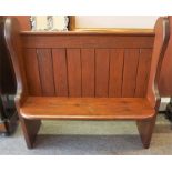 A Victorian Pitch Pine Church Pew, 107cm high, 110cm wide, 56cm deep