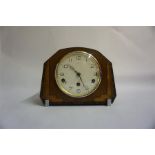 Walnut mantle clock with Westminster Chimes and an eight day movement