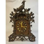A Large Black Forest Cuckoo Twin Train Bracket Clock, circa 19th century, with a carved cuckoo