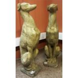 A Pair Of Composite Garden/Outside Dog Figures, in upright seated pose, raised on square plinth,