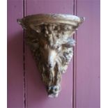 A Pair Of Giltwood Wall Brackets, modelled as rams heads, 23cm high Condition report One wall