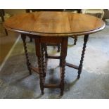 A Small Oak Gateleg Table, raised on barley twist legs,71cm high, 81cm long, 90cm wide