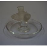 A Lalique Glass Pin dish, with a bird surmount, signed Lalique to underside, 9cm diameter
