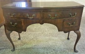 An Edwardian Mahogany Dressing Table, with two long drawers above two small drawers, (has areas of