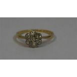 A Ladies Diamond Flower Head 18ct Gold Cluster Ring, size O