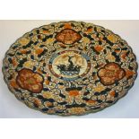 A Large Japanese Imari Platter, Meiji period, circa late 19th century, decorated with all over