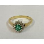 A Ladies Diamond & Emerald 9ct Gold Cluster Ring, ring size M