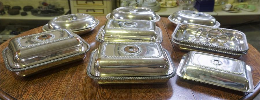 A Quantity Of Silver Plated Entree Dishes, with associated covers, four screw handles, and two spare