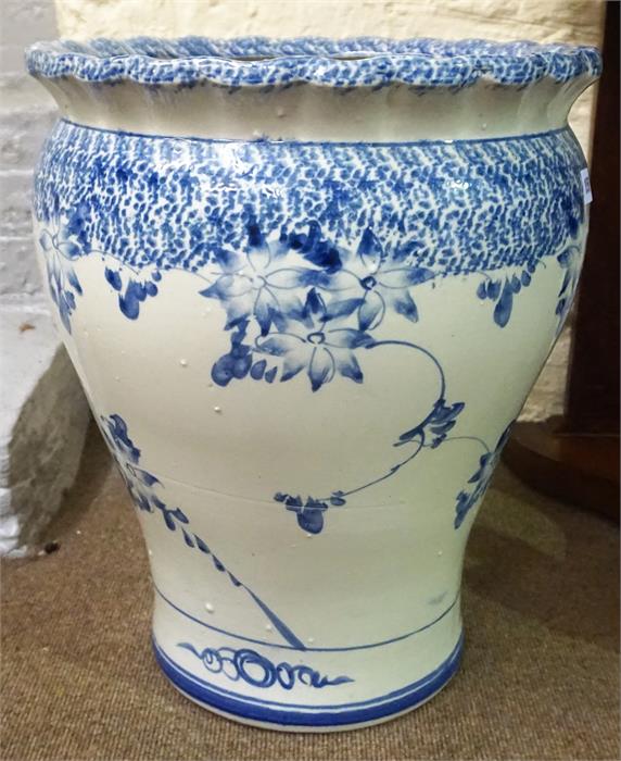 A Large Delft Style Blue & White Pottery Planter, Decorated with floral panels, 50cm high