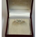 An 18ct White Gold & Diamond Ladies Ring, set with three Diamonds, size M