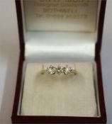 An 18ct White Gold & Diamond Ladies Ring, set with three Diamonds, size M