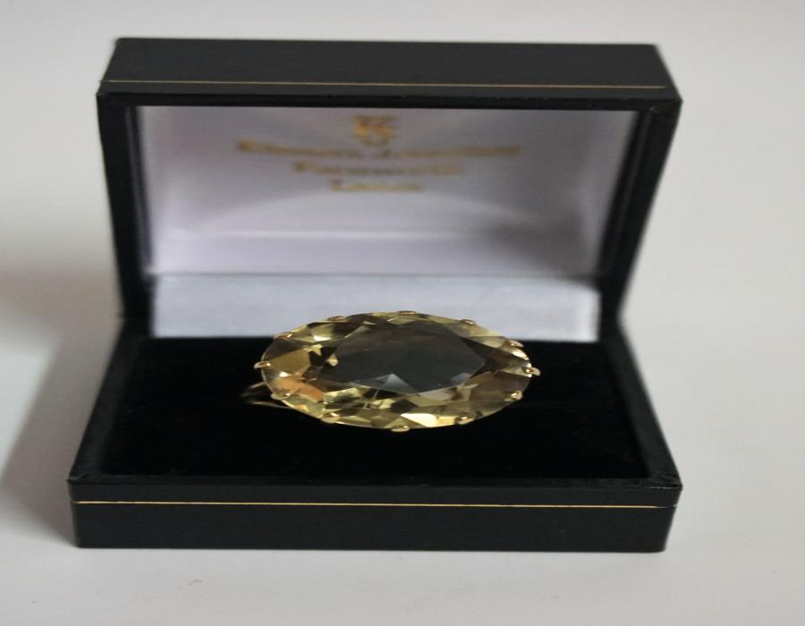 A 9ct Gold Citrine Cocktail Ring, the large citrine stone is approximately 2.2 cm diameter,