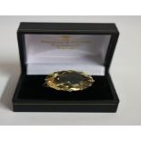 A 9ct Gold Citrine Cocktail Ring, the large citrine stone is approximately 2.2 cm diameter,