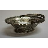 A Silver Bon-Bon Basket, Hallmarks for Lionel Alfred Crichton, London 1912, with swing handle and