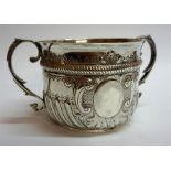 A Victorian Silver Loving Cup, Hallmarks for Thomas Bradbury & Sons, London 1888, with twin handles,
