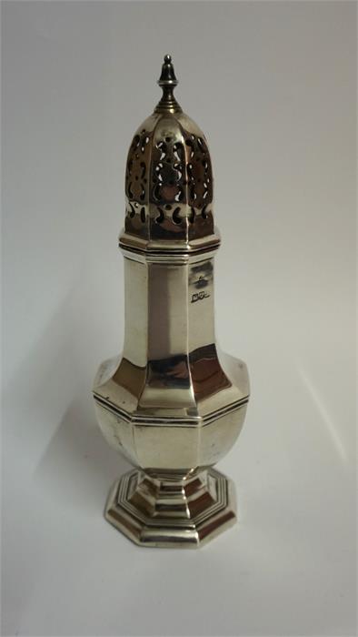 A Silver Sugar Sifter, Hallmarks for Chester, with a pierced detachable lid above an octagonal