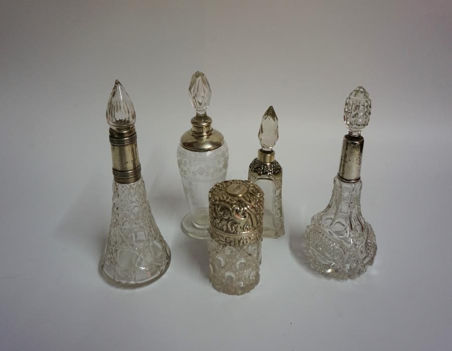 Five Assorted Silver Mounted Glass Toilet Bottles/Jars, circa early 20th century, four examples with