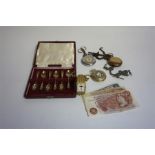 A Mixed Lot Of Jewellery, Silver & Banknotes, to include a 9ct gold opal ring, a silver albert
