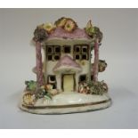 A 19th Century Staffordshire Pottery Pastille Burner, in the form of a house, encrusted with