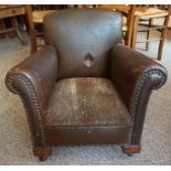 A Vintage Brown Hide Childs Armchair, 55cm high