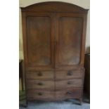 A Regency Mahogany & Ebony Strung Linen Press On Chest, with two panelled doors enclosing fitted