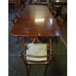 A Reproduction Mahogany Twin Pillar Dining table With Eight Dining Chairs, in the Regency style,