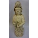 A Large Chinese Blanc De Chine Glazed Pottery Figure Of Guanyin, 20th century, wearing a robe and