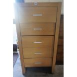 A Modern Light Oak Chest Of Drawers, with five drawers, 128cm high, 63cm wide, 45cm deep.