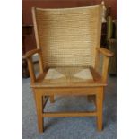 A Reproduction Childs Orkney Chair, with woven back rest and seat, 85cm high
