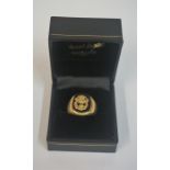 A 9ct Gold & Onyx Gents Signet Ring, with crest, stamped 375, overall weight 5.2 grams Condition
