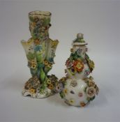 A Derby Pottery Bud Vase, circa 19th century, Decorated with encrusted flowers, unmarked, 19cm high,