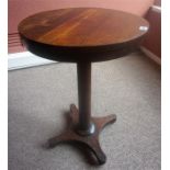 A William IV Rosewood Occasional Table, the circular top raised on a cylindrical column and