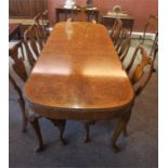 A Burr Walnut Eleven Piece Dining Room Suite, Retailed by Jenners of Edinburgh, circa mid 20th