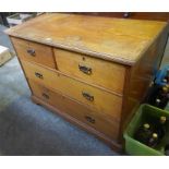 An Oak Chest Of Drawers, circa early 20th century, with two short drawers above two long drawers,