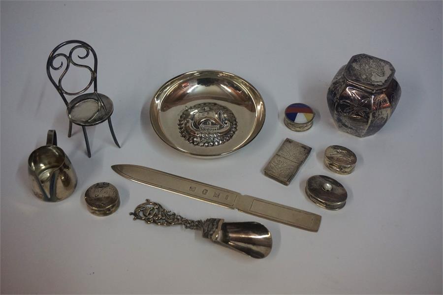 A Small Quantity Of Silver & White Metal, to include a letter opener, three pill boxes, a stamp box,