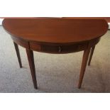 A Reproduction Mahogany Demi-Lune Side Table, with single drawer, raised on tapered legs, 73cm high,