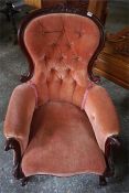 A Victorian Style Spoon Back Armchair, Upholstered in later pink button back velour, 104cm high