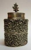 A 19th Century Dutch Silver Tea Caddy, the detachable lid having a finial to the top depicting a